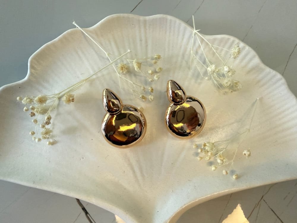 Aretes Esfera Orgánica Dorado en acero inoxidable