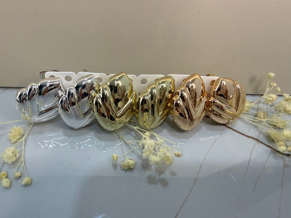 Aretes Pétalos Esculturales en acero inoxidable