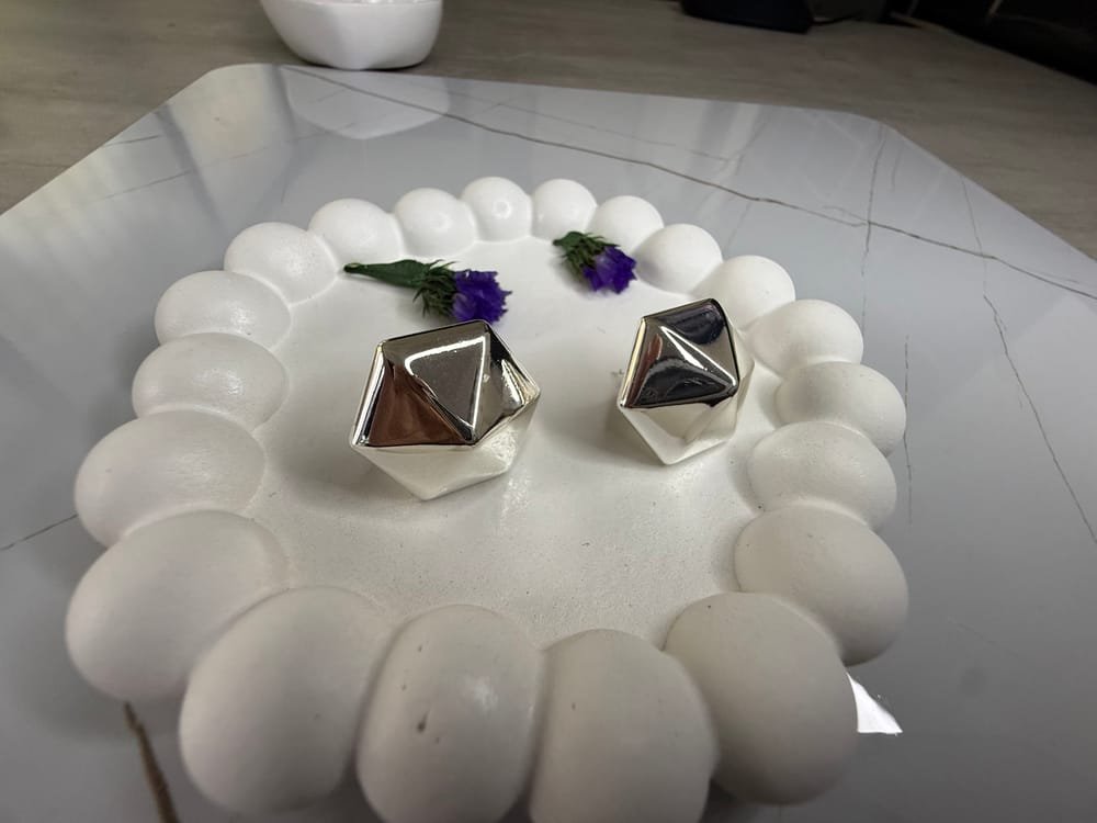 Aretes Poliedro Pulido Plateado en acero inoxidable