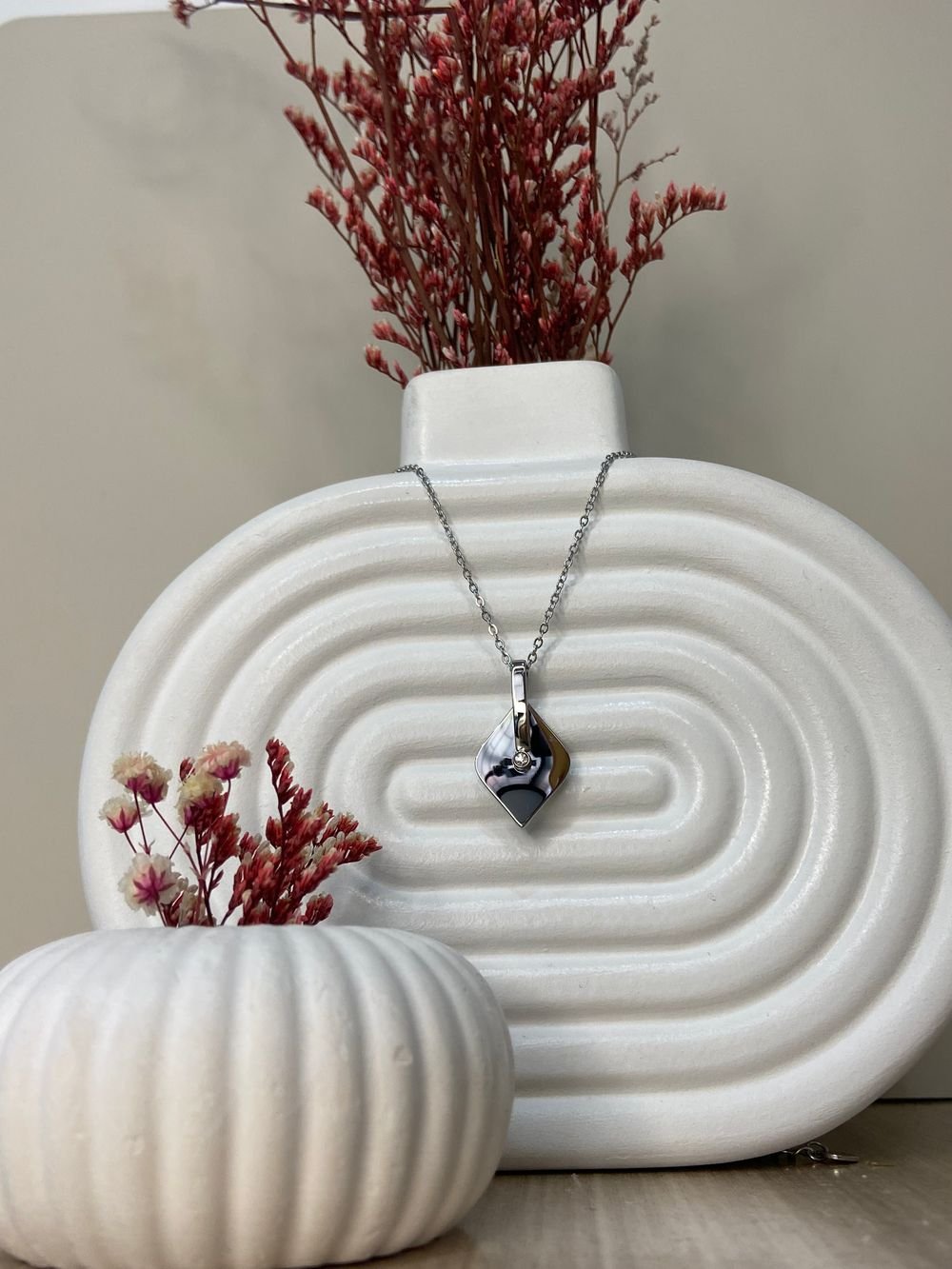 Collar Rombo Punto Luz en acero inoxidable