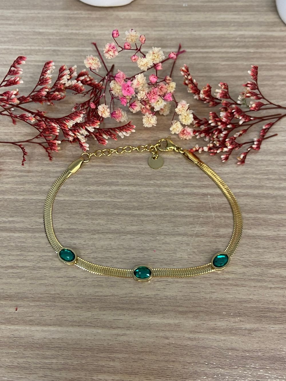 Pulsera Serpiente Esmeralda Dorado en acero inoxidable